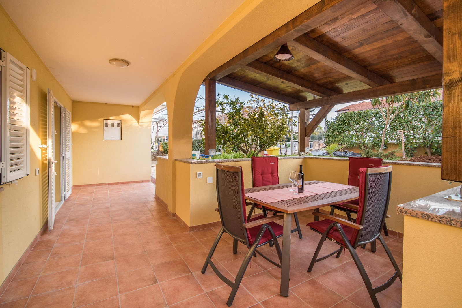 Terrace with garden view in Apartment 4.